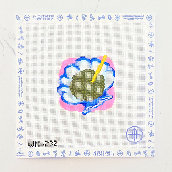 A square needlepoint canvas featuring a stylized flower with a green center, blue and pink outlines, and a yellow pencil, displayed on a light marble surface. The canvas has a blue border with small icons and the text 'WN-232' printed at the bottom left.