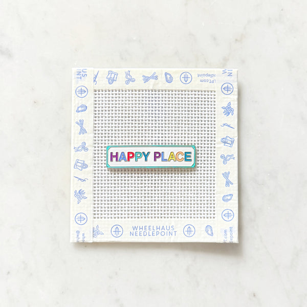 Needle minder with the words 'Happy Place" on it