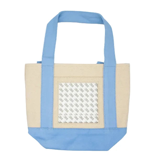 Tote bag with blue straps and beige body on a white background